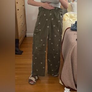Reformation Green Cargo pants with daisies